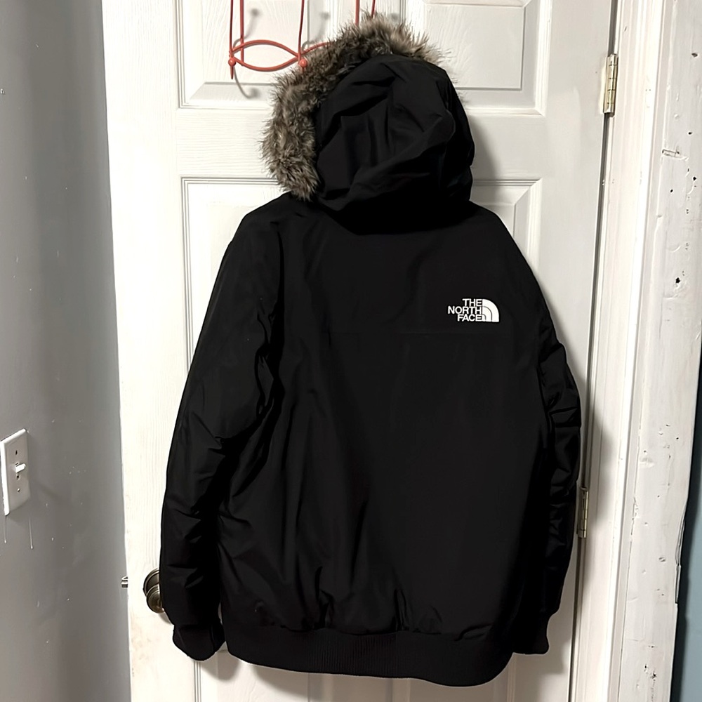 Down filled The North Face Outdoor Men’s jacket.